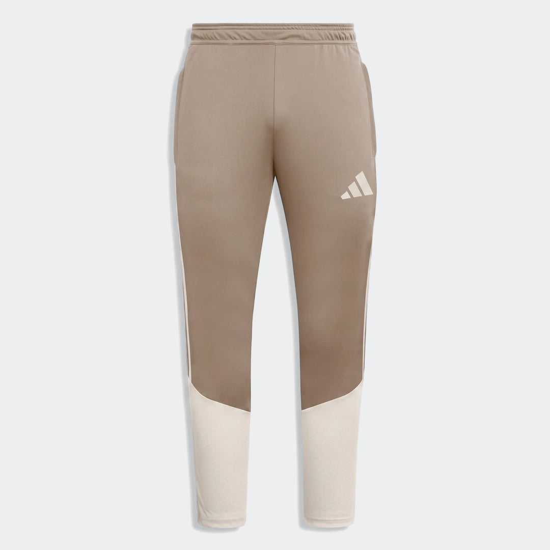 Tior26C Pant brown athletic pants with off-white panels and a white logo, designed for comfort and performance.