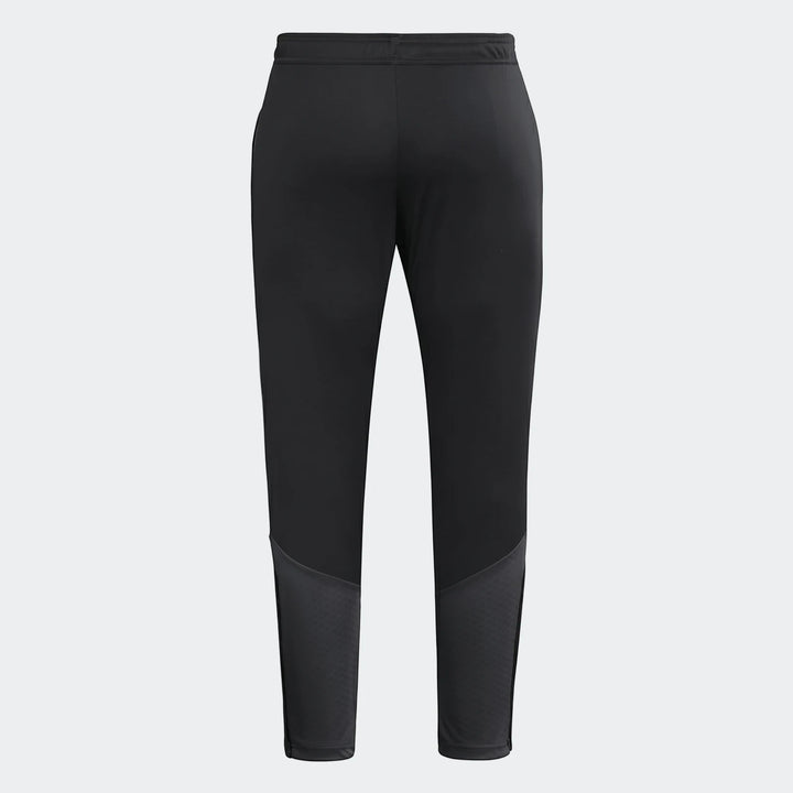 Black Tiro 26 Competition Training Pants, shown from the back, featuring an elastic waistband and textured lower leg panels.