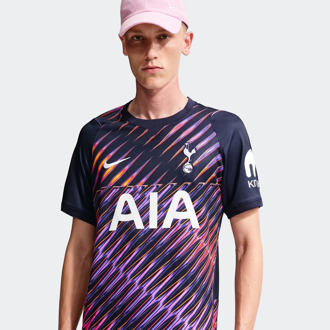 Male model wearing a navy blue Tottenham Hotspur 2026/27 Stadium Away Men'S Nike Dri-Fit Soccer Replica Jersey with a