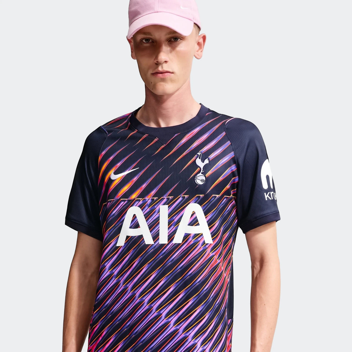 Male model wearing a navy blue Tottenham Hotspur 2026/27 Stadium Away Men'S Nike Dri-Fit Soccer Replica Jersey with a