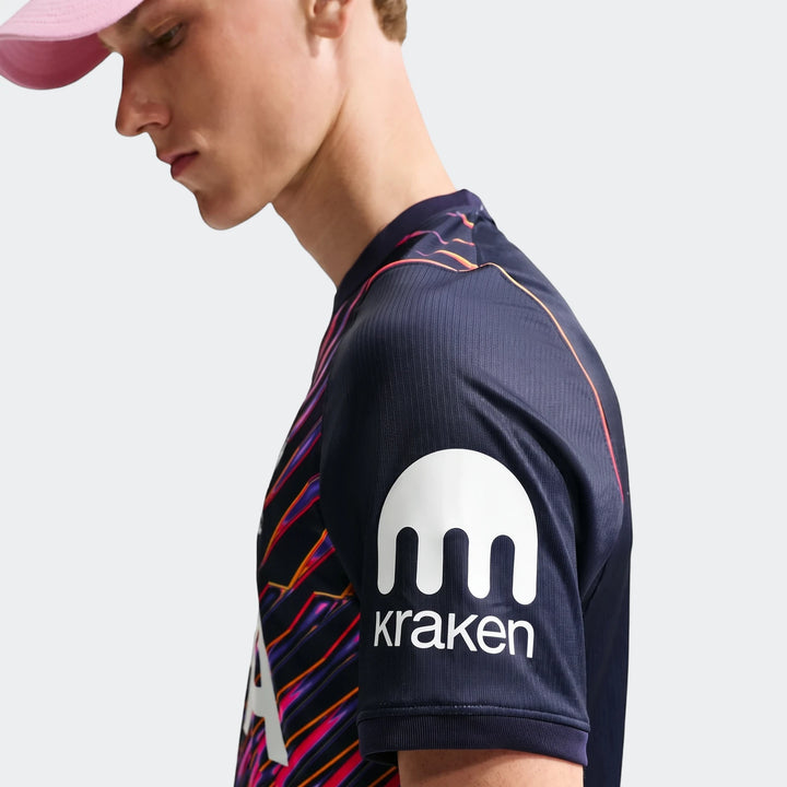 Close-up of a man wearing a dark blue Tottenham Hotspur 2026/27 Stadium Away Men's Nike Dri-Fit Soccer Replica Jersey with