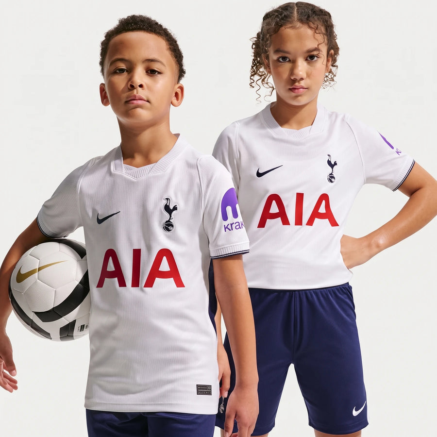 Two kids modeling the white Tottenham Hotspur 2026/27 Stadium Home Nike Dri-Fit Soccer Replica Jersey, with one holding a