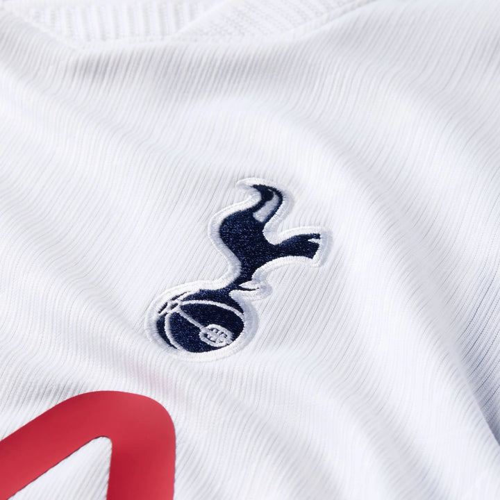 Close-up of a white Tottenham Hotspur 2026/27 Stadium Home Nike Dri-Fit soccer jersey featuring the embroidered dark blue