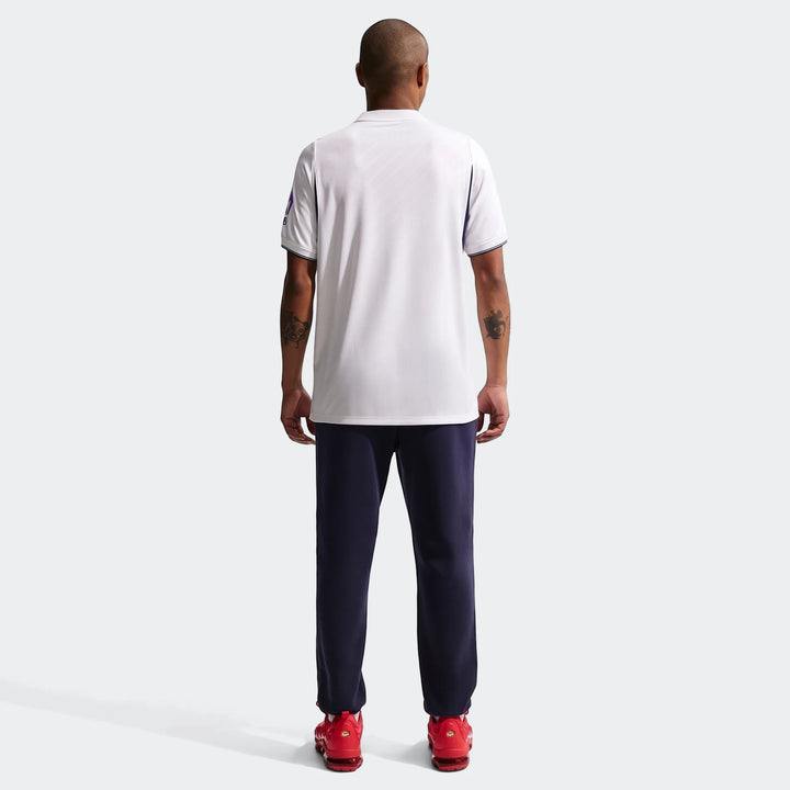 Rear view of a male model in a white Tottenham Hotspur 2026/27 Stadium Home Men's Nike Dri-Fit Soccer Replica Jersey.