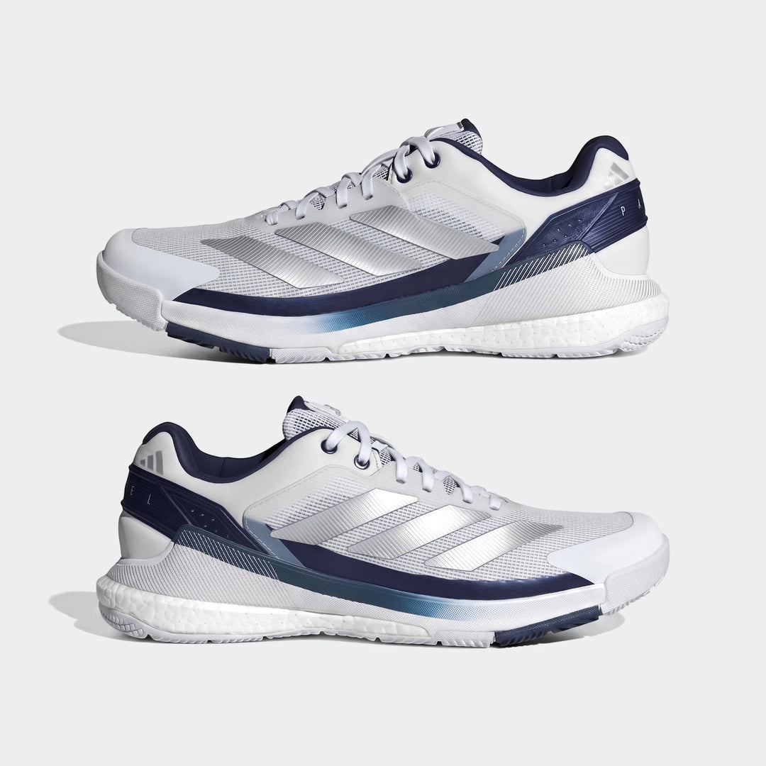 Two white and navy Adidas Crazyquick Boost Padel Shoes, featuring Boost midsole and mesh upper, shown from a side view.