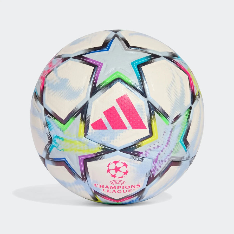 Uefa Champions League 26/27 Pro Ball, white with colorful star patterns and official logos, isolated on white background.