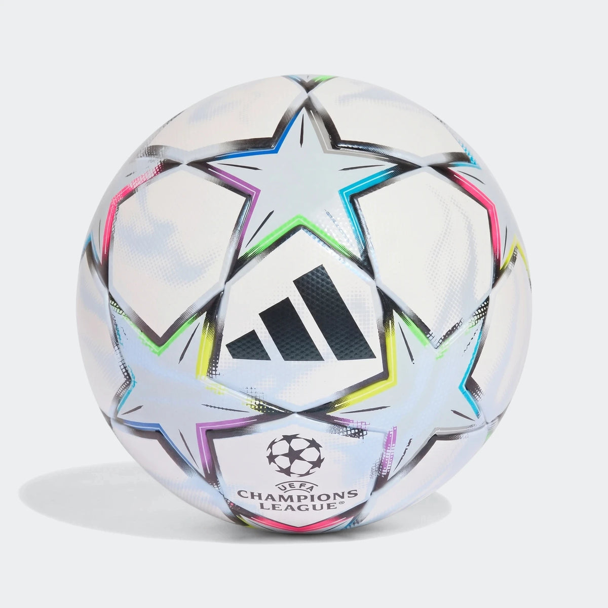 Uefa Champions League 26/27 League Ball, white with colorful star graphics and black Adidas logo, studio shot.