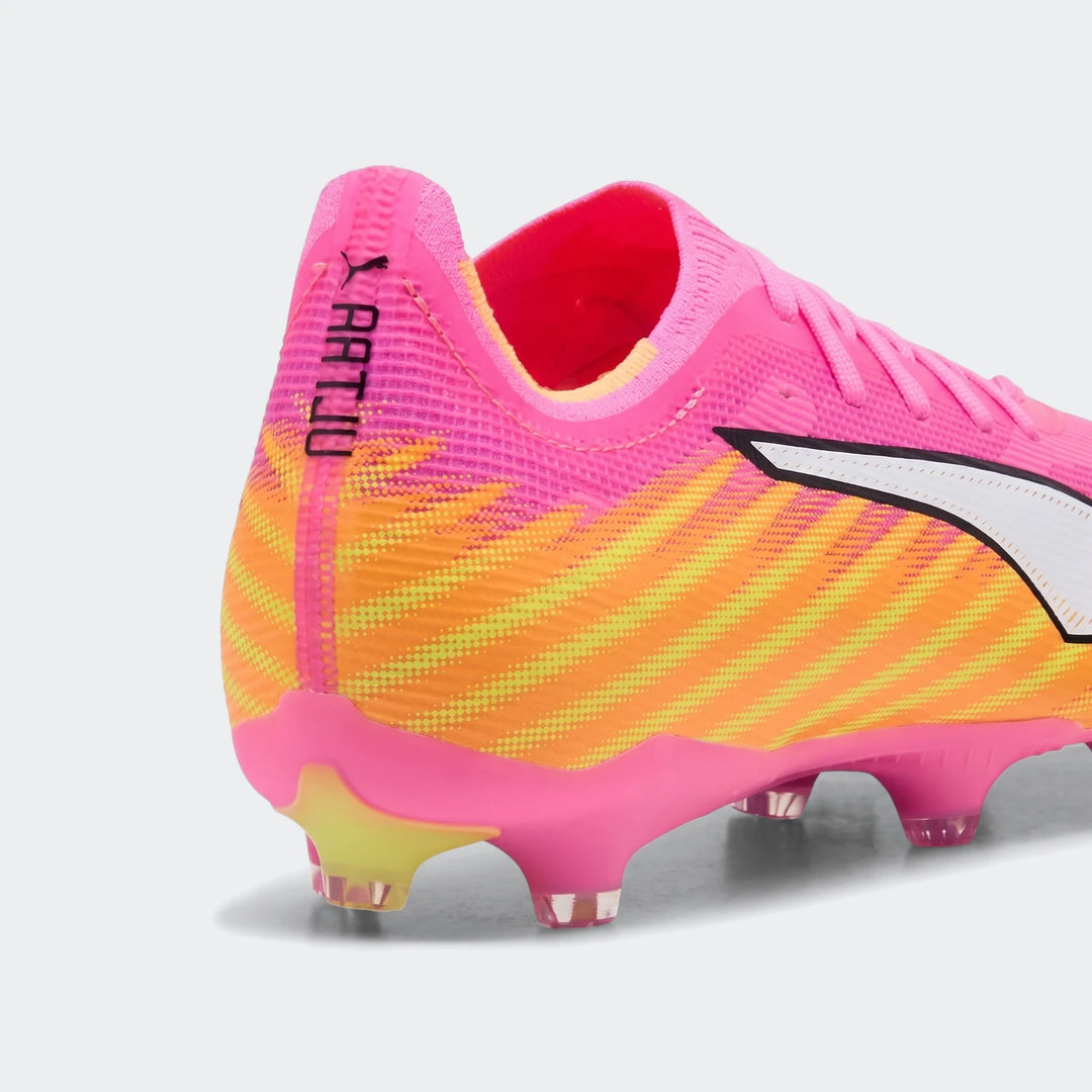 Unisex Ultra 6 Match Fg/Ag football boots in a vibrant pink and orange striped pattern, showing the side and heel.