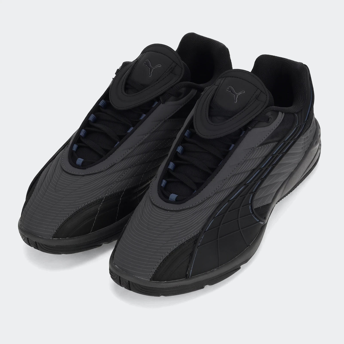 A pair of Puma V-S2 Tactical sneakers in black and dark gray, viewed from the front-left on a white background.