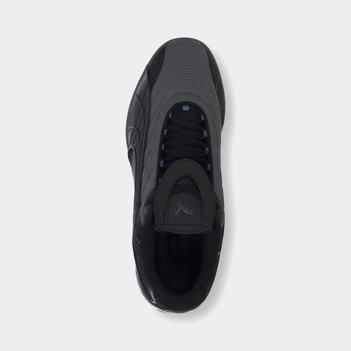 V-S2 Tactical Puma Black sneakers, showcasing a sleek black design and textured upper, captured in a top-down view.
