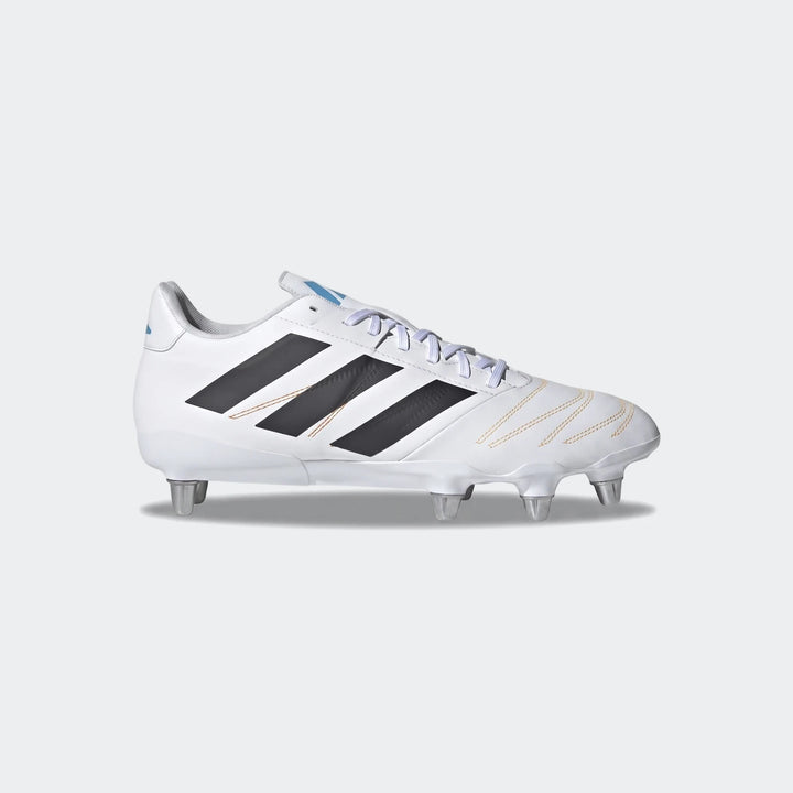 White Adidas Kakari Elite SG Rugby Boots with black three stripes, white laces, and light blue accents, shown in a side