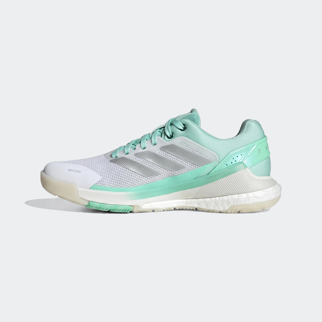 White and mint green Adidas Crazyquick Boost Padel Shoes, featuring silver stripes and an "ADITUFF" toe, presented in a side