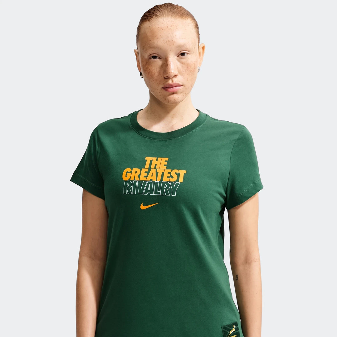 Woman wearing a dark green 2026 Nike Springboks Rugby's Greatest Rivalry Tour T-shirt, front view.