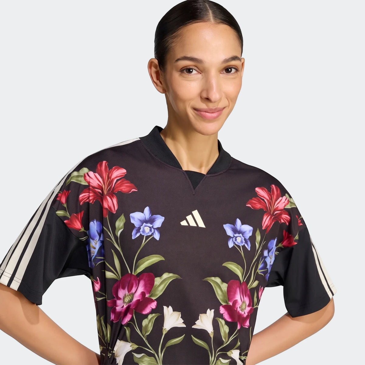 X Farm Rio Premium Dress in black with a vibrant floral print, worn by a smiling woman.