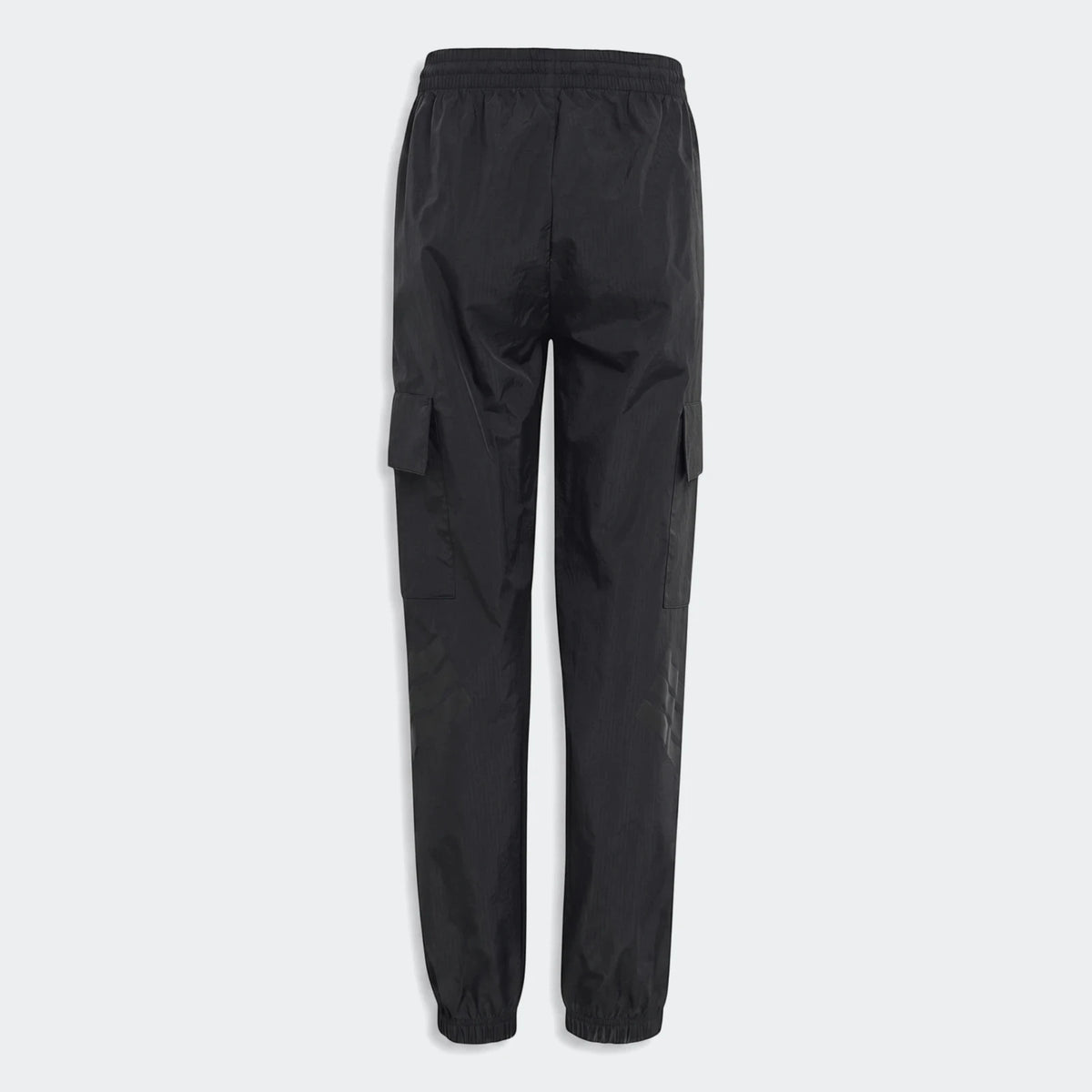Youth Mercedes-AMG Petronas Formula 1 Team Night Woven Pants in black, featuring a cargo style and elasticated cuffs, shown