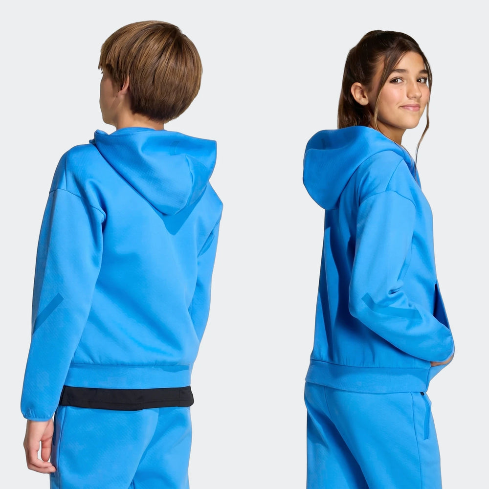 Blue Youth Z.N.E. Full-Zip Hoodie and sweatpants worn by two youth models, one seen from back, one from front-right.