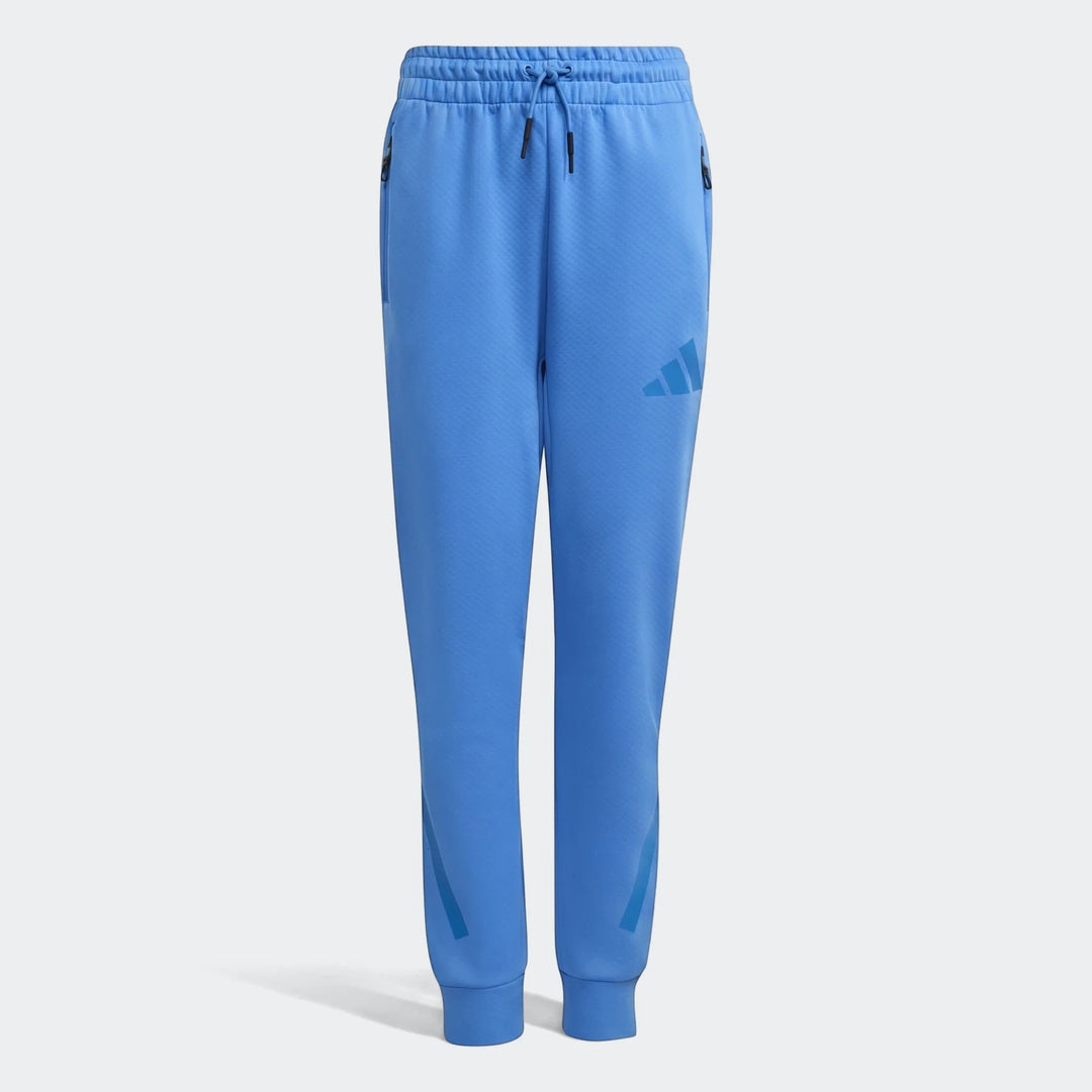 Blue Youth Z.N.E. Track Pants with a subtle honeycomb texture and iconic Adidas branding, shown front view.