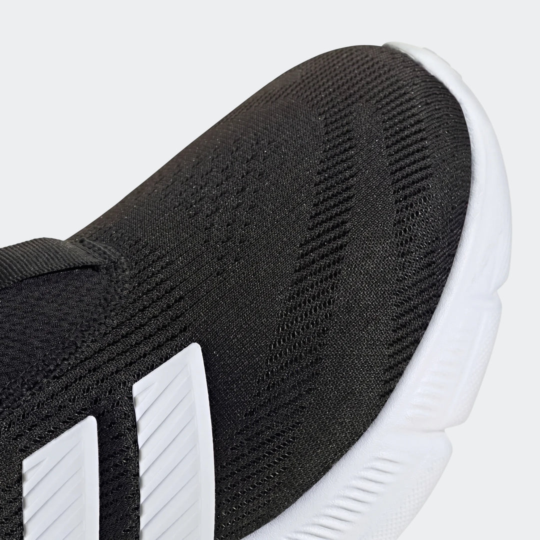 Close-up of a Z.N.E. Track Top, showcasing its black knit fabric construction with a distinctive textured pattern, accented