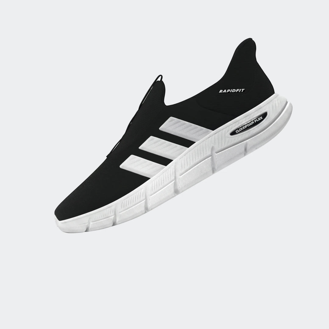 Black and white ZNE athletic sneaker with 'RAPIDFIT' and 'CLOUDFOAM FLEX' text, knit upper, and textured white sole.