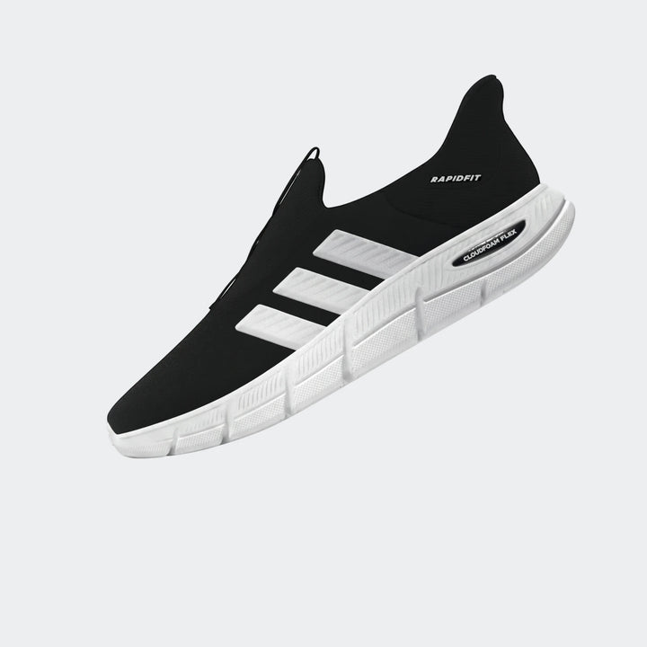 Black and white ZNE athletic sneaker with 'RAPIDFIT' and 'CLOUDFOAM FLEX' text, knit upper, and textured white sole.